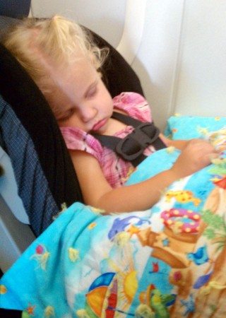 Is there any more beautiful sight for a Mommy on a 5-and-a-half hour flight.
