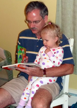 Pepe reading to Annada before bed.