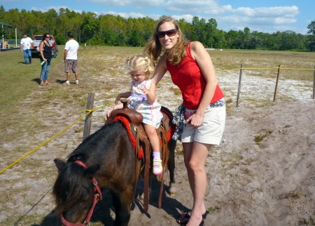 Annada's first pony ride.