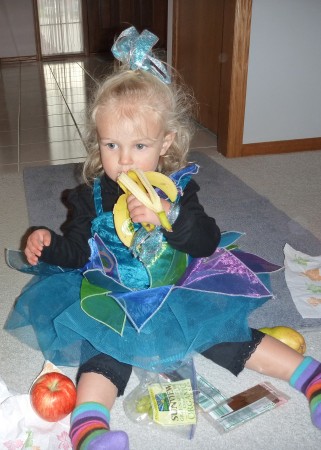 After she was done trick or treating I let her pick out one thing to eat. And she picked the organic banana Grandma gave her!