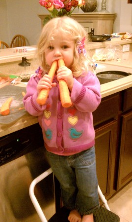 She's a double-fisted carrot eater.