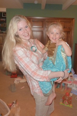 Annada plays dress-up with Aunt Erica. She's an Indian Princess.