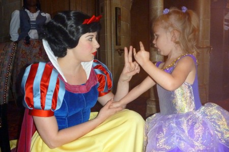 I love this psicture because it shows how Annada shows the number 2. She has always done it like that. She is telling Snow White that she is two-years-old.